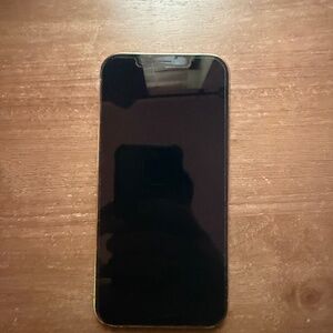 iPhone 12 Pro Max gold and airpods